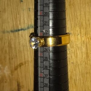 Elegant Gold Ring with Clear Cubic Zirconia Stone. Size 10.